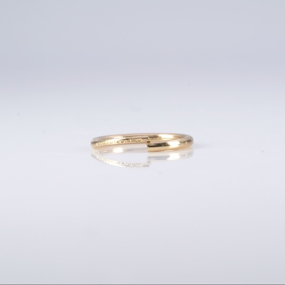 Solid 14k yellow gold small hoop earrings .3 grams - Picture 3 of 7